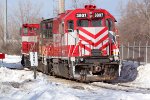 WSOR 3807 and two MP15s idle outside the Villard Ave. shops